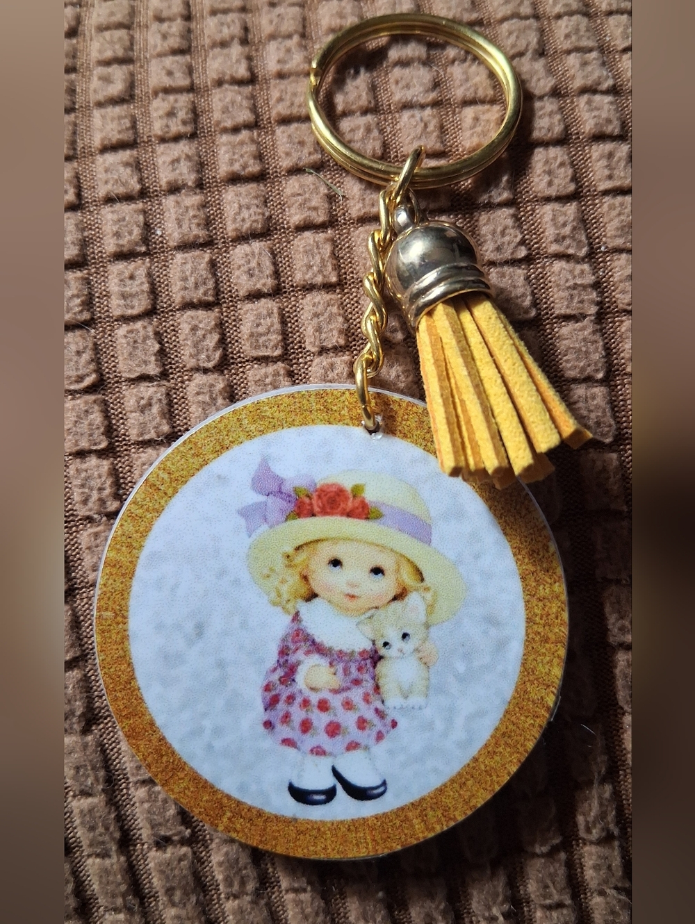 Yellow Tassel Keychain with Cute Girl & Boy Charm